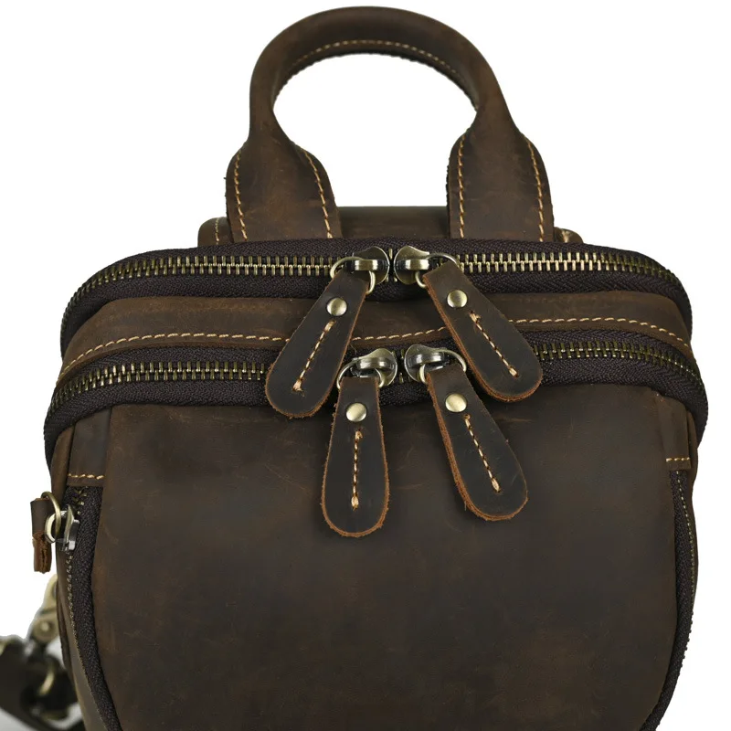 حقائب صدر كلاسيكية بكتف واحد من جلد البقر الأصلي باللون البني مع جيوب متعددة بسحاب وحزام قابل للتعديل