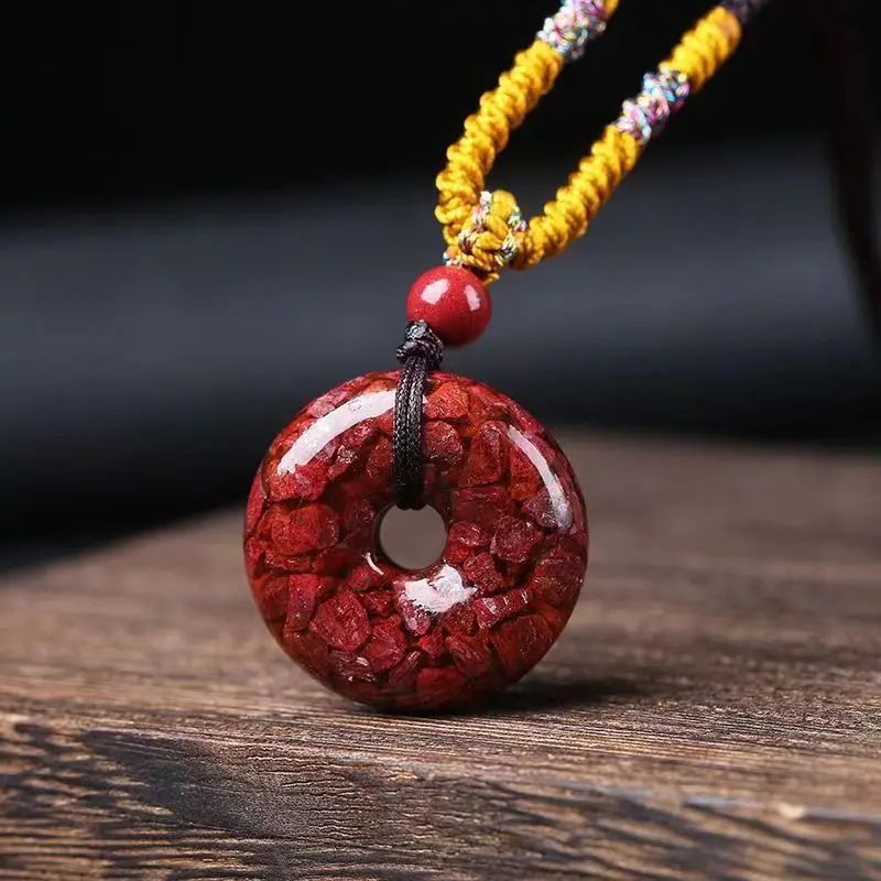 A Pendant With High Content Of Ore, Translucent Sand, And A Peace Symbol Design, Featuring Imperial Ci
