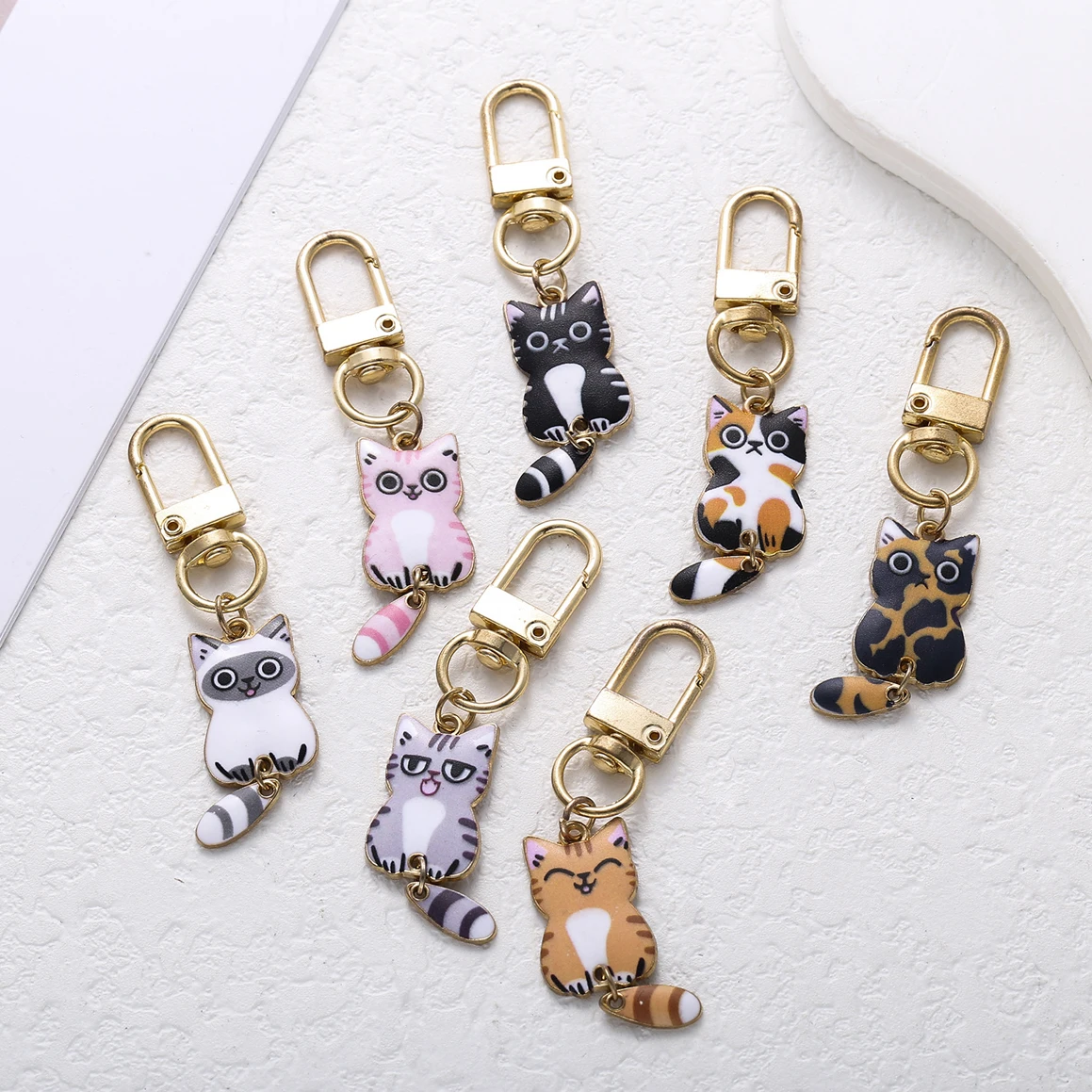 Kawaii Wagging Tail Cat Key Rings Creative Enamel Kitten Metal Keychains Earphone Case Pendant Bag Ornaments Souvenir Gifts