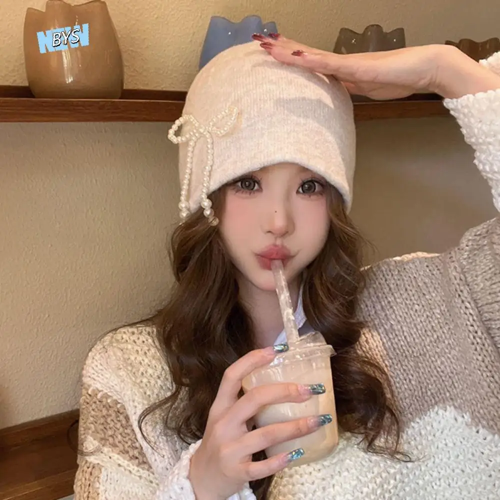 

Solid Color Pearl Bow Beanies Cap Ear Protector Casual Stacking Knitted Bonnet Cap Thickened Warm Korean Wool Hat Daily