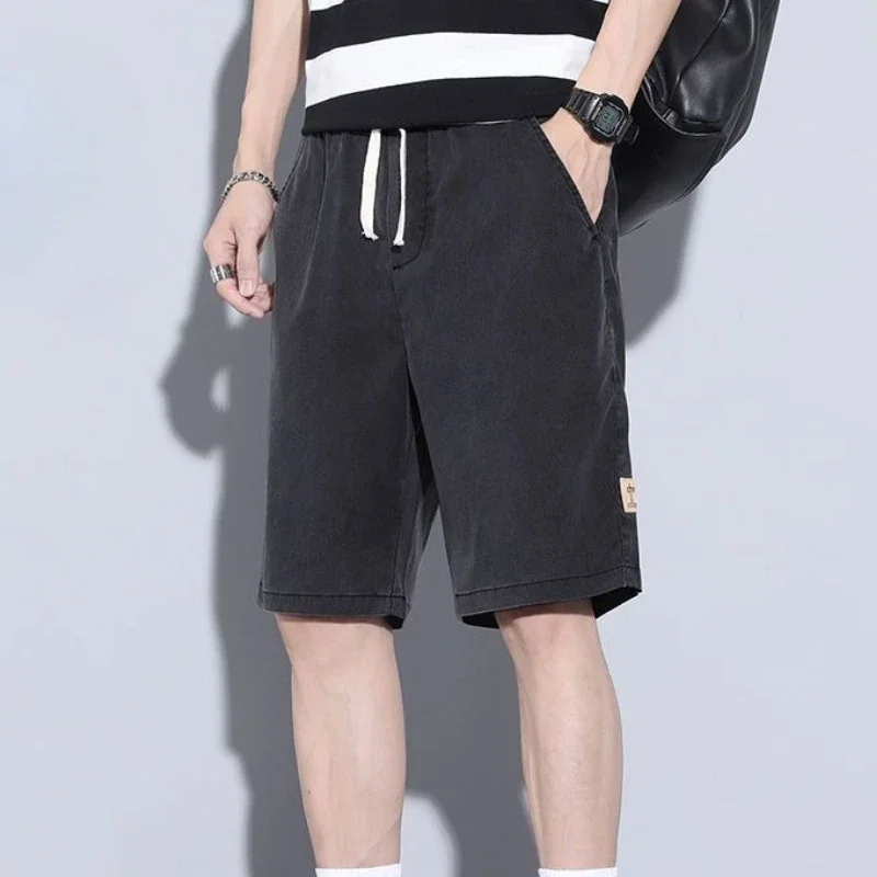 Pantaloncini di jeans da uomo larghi Bermuda jeans corti Pantaloni da uomo lunghi metà larghi con tasche Coulisse Y2k Moda Streetwear Emo