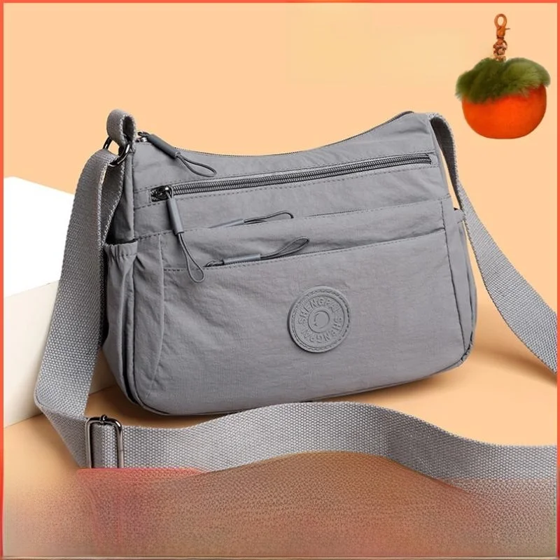 

Сводная большая нейлоновая сумка через плечо Capaci для женщин среднего возраста. Сумка на одно плечо с несколькими предметами. Новинка 2025 года.