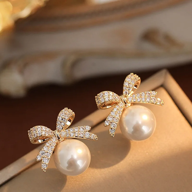 

Niche Design Sparkling Bow Pearl Stud Inlay Zircon Earrings Light Luxury Fashion Jewelry Women Gifts Wedding Birthday