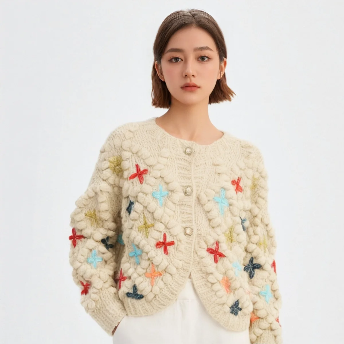 

Оптовая продажа высококачественных кардиганов и свитеров для женщин с вязаными крючком шариками, закручиванием и звездами.