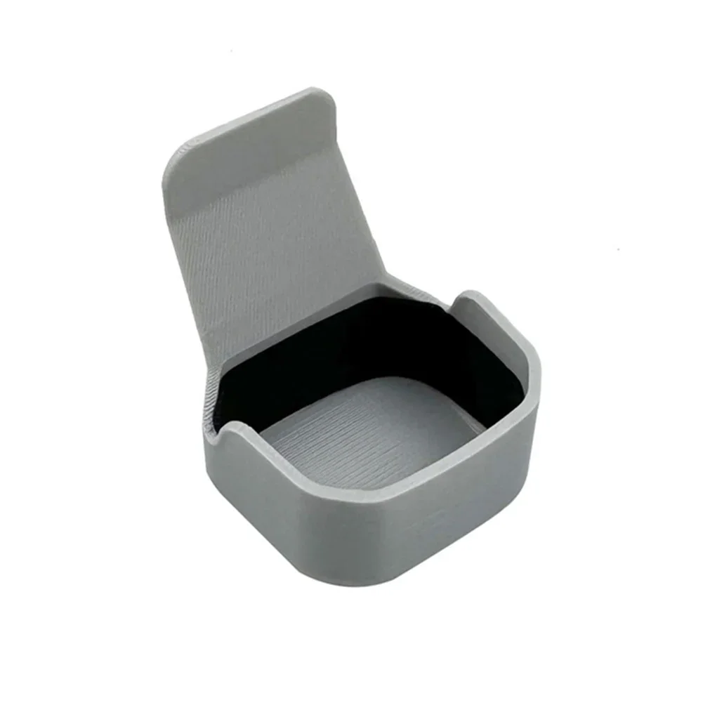 

Крышка объектива из АБС-пластика для DJI NEO, обеспечивающая безопасную транспортировку, хранение и обращение с компонентами системы визуального позиционирования.