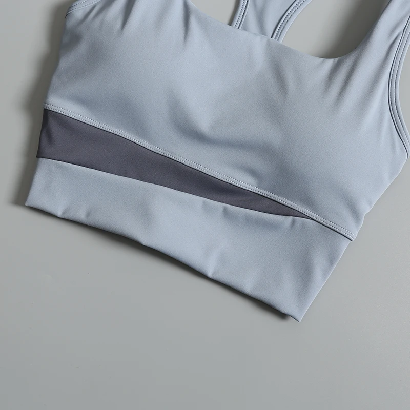 夏の女性用スポーツブラと下着新しいランニングベストスタイルの外部着用耐衝撃性とたるみ防止ジムビューティーバック