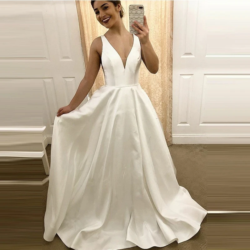 

Wholesale Simple Satin Sexy V Neck Wedding Dress Straps Backless Wedding Gown A Line Bridal Dress Robe De Mariage 2023