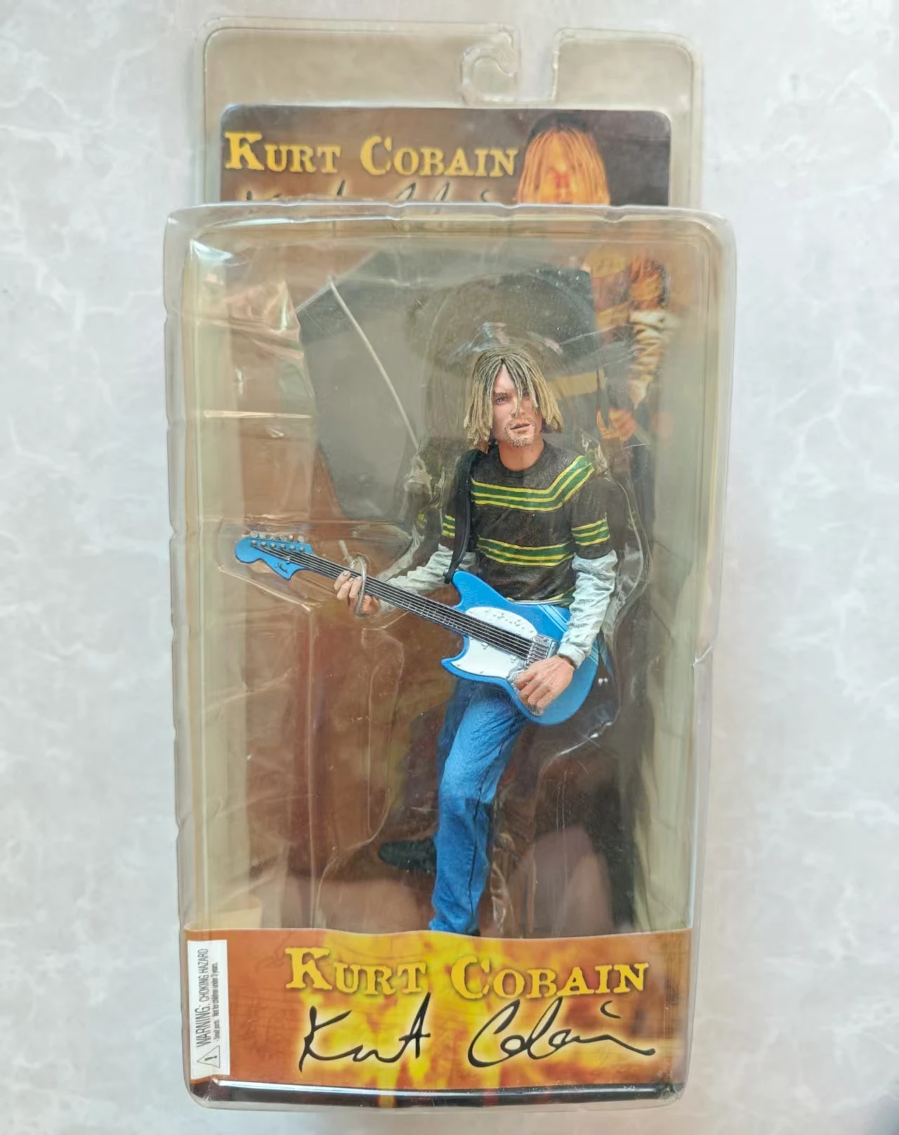 

NECA 2006 KURT COBAIN Neca 7" Action Figure Blue Guitar Smells Like Teen Spirit Version Minor damage to the sealed box