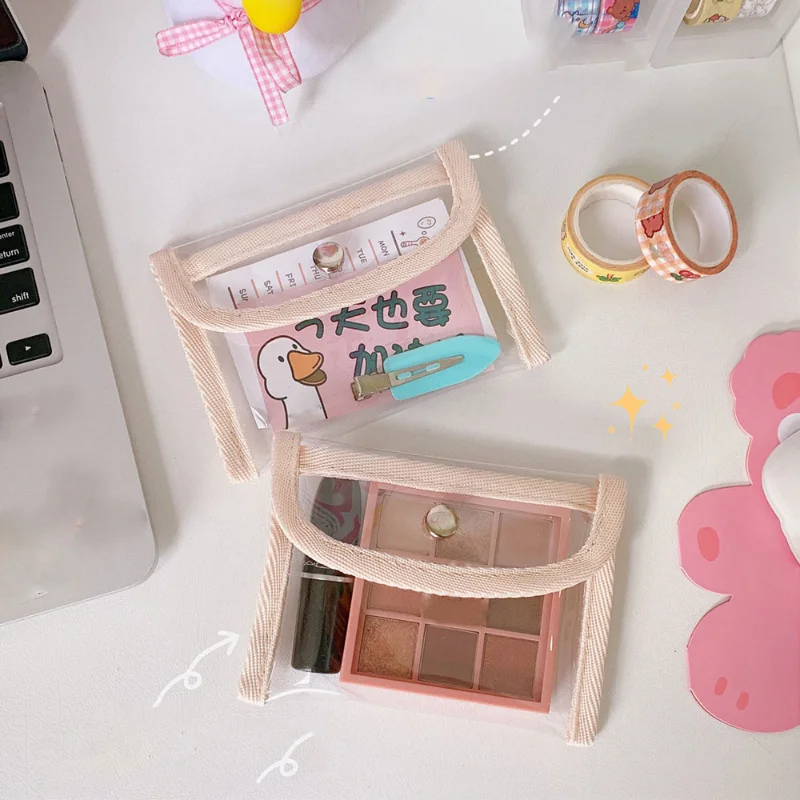 Bolsa de almacenamiento de cosméticos pequeña transparente para mujer, bolso de Pvc a la moda para lápiz labial, llaves, auriculares electrónicos,