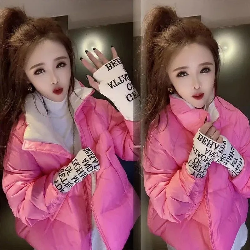 Kurtka puchowa odmładzająca, krótka, zimowa, ze stójką, lekka, z rękawami ze sznurkiem, modny design, wysoki poziom estetyczny.