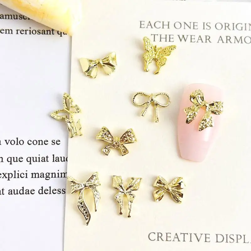 10 Uds. De dijes para uñas con lazo de mariposa de aleación exquisita, lazos de línea dorada ahuecados en 3D, decoraciones artísticas para uñas de mariposa doble para bricolaje