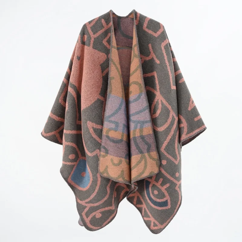 A ladies autumn and winter fashion Europe and the United States shawl female cashmere cloak graffiti jacquard shawl to keep warm