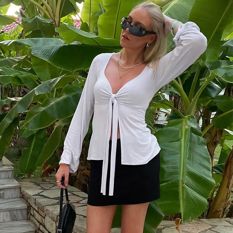 Nuova t-shirt autunno inverno donna Sexy petto basso scollo a v Top Streetwear moda maniche lunghe solido femminile Club Party Versatile Tees