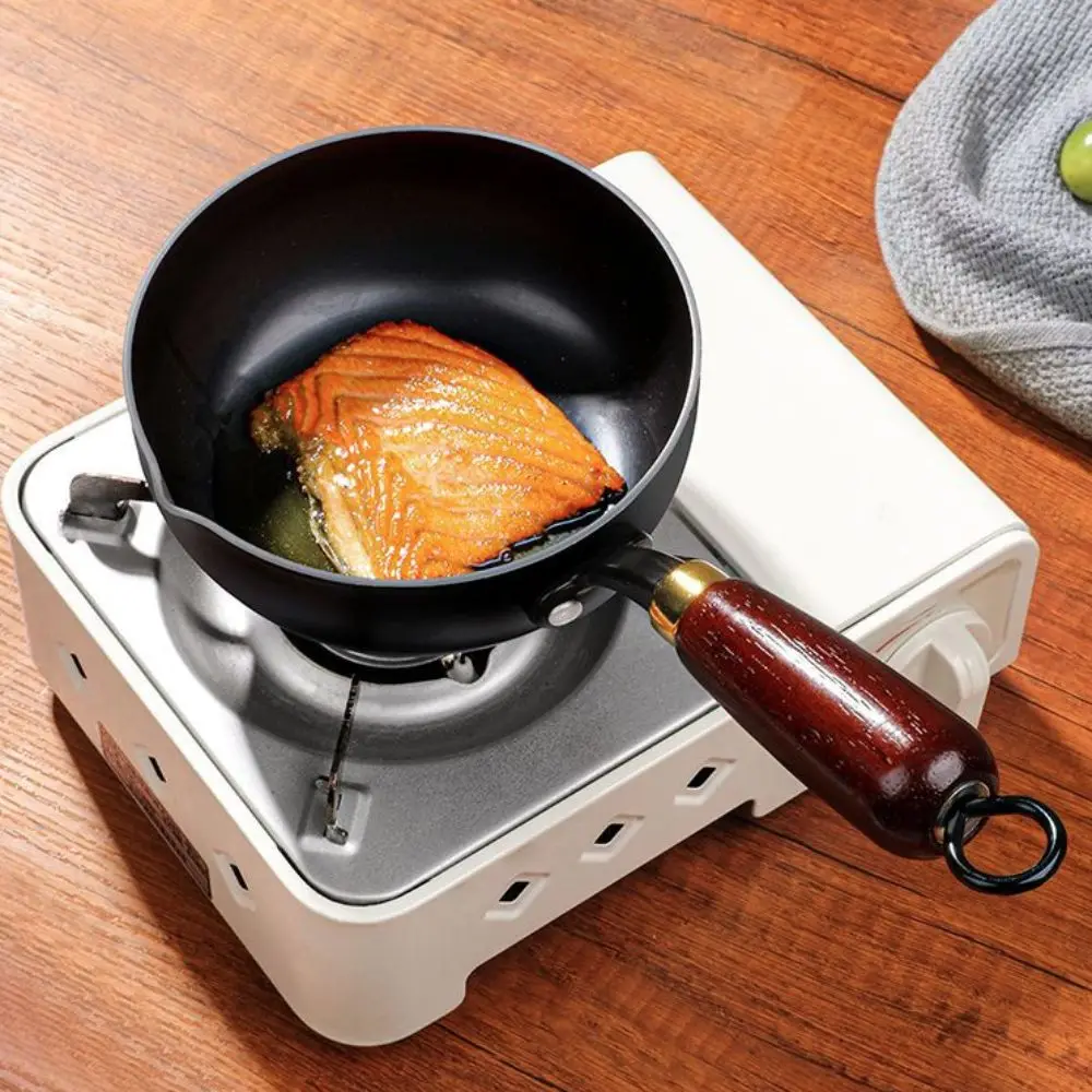 

Multi-purpose Cast Iron Oil Splashing Pot Uncoated V Shape Diverter Port Milk Pot Mini Wooden Handle Omelette Pan Chocolate