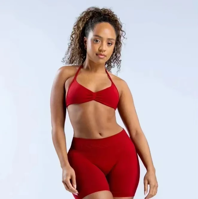 インパクトストラップブラジャーとロゴストラップバックレスヨガジムブラジャー取り外し可能なカップ女性トレーニング服ジムトップホルタースポーツブラジャー