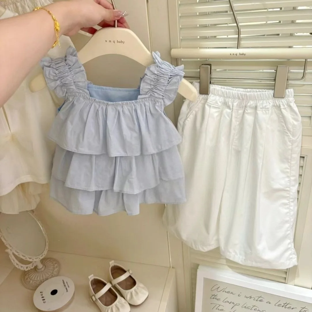 

2025 Summer New Girls' Korean Style French Ruffled Skirt and Nine Inch Pants Made of Pure Cotton Two-piece Set in Beige