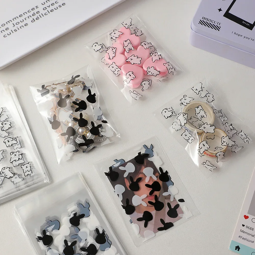 50枚入り カワイイ子犬柄フォトカードスリーブバッグ 3インチカードホルダー 保護カバー 小型OPP袋パッケージ