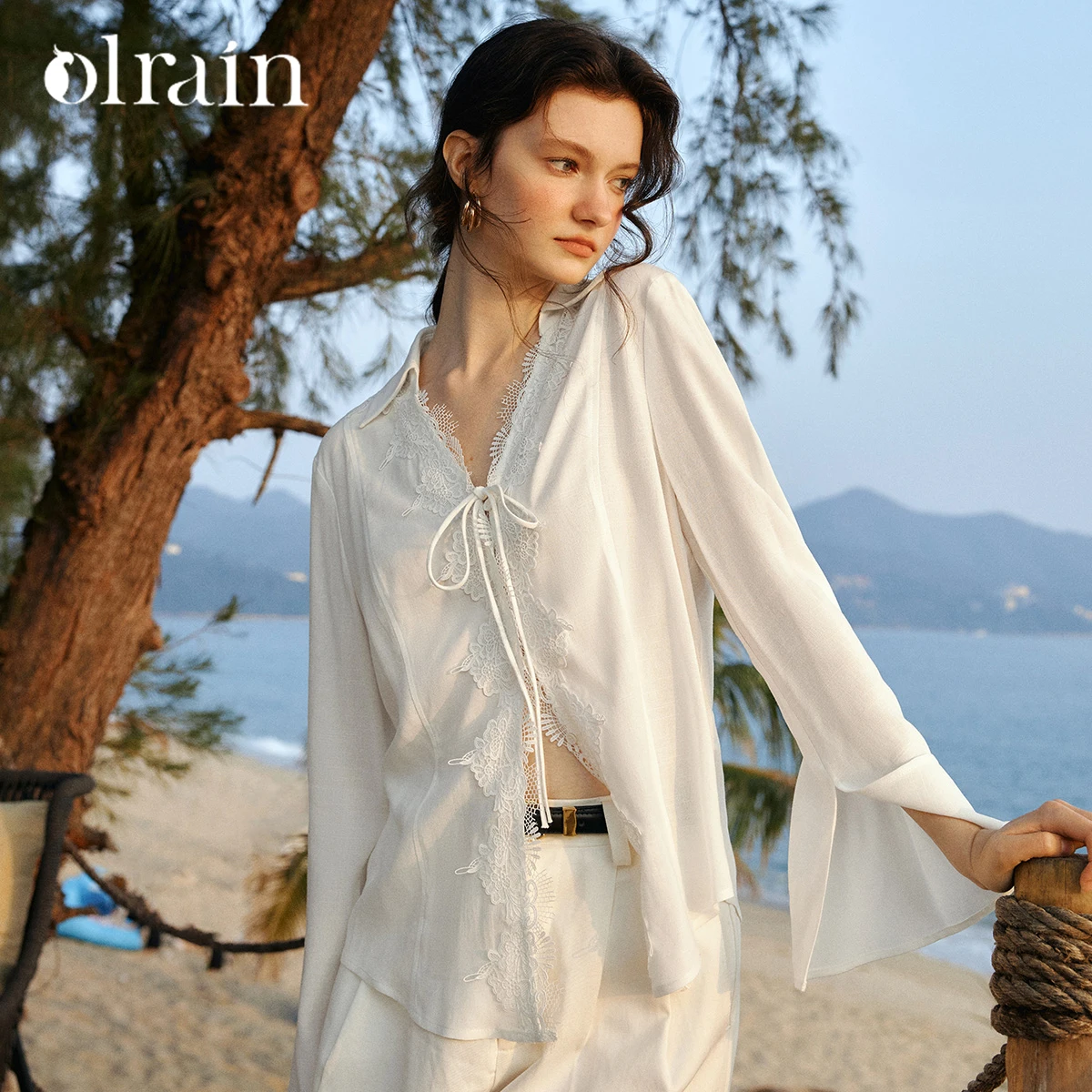 

OLrain 2026 Spring New Women's French Style Romantic Vacation Lace Trim White Long Sleeve Loose Shirt O58CC003902