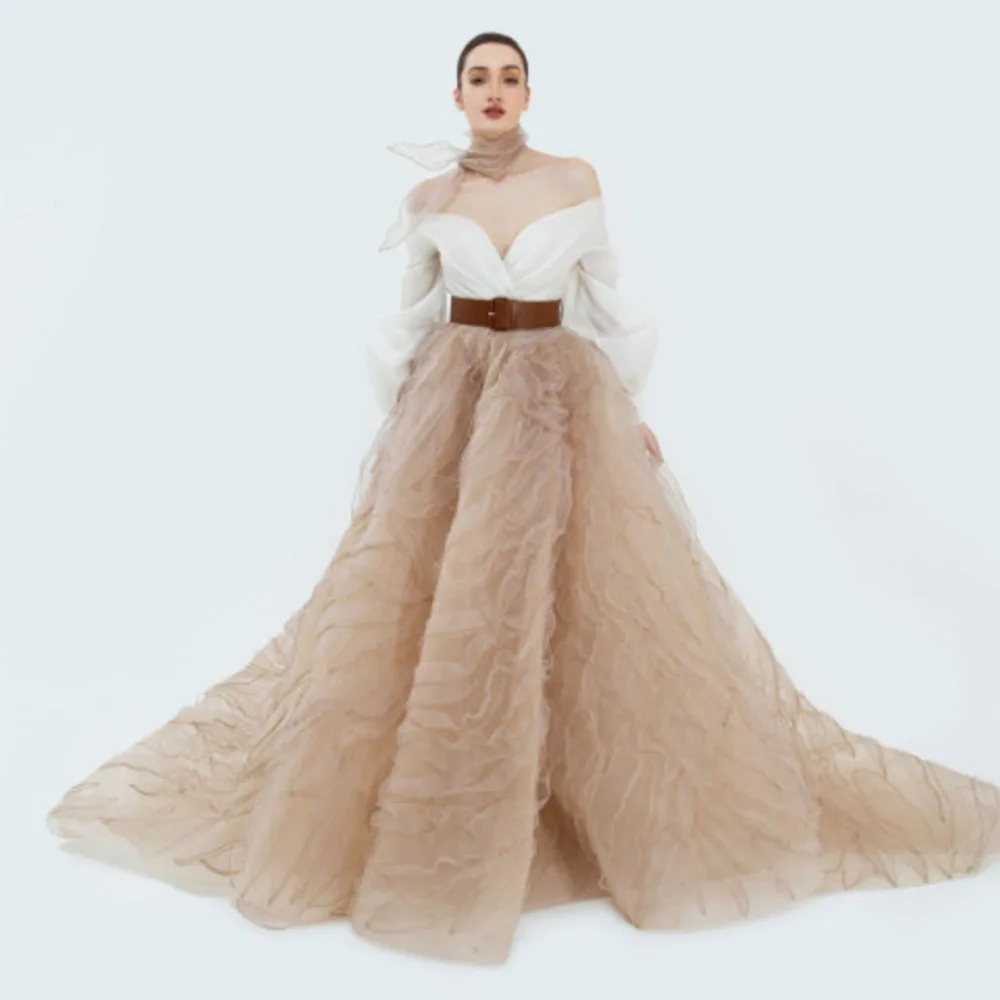 

HOBBY Brown Tulle Skirt With Layered Ruffles And Flowy Design Features A High Waist And Full Volume Perfect For Formal Events An