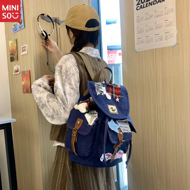 Miniso Nueva mochila Hello Kitty Bone, patchwork de mezclilla desgastado, mochila con bloques de color