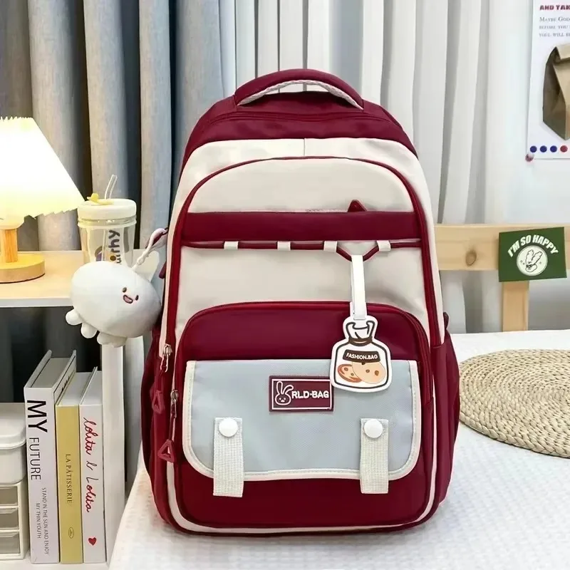 

2025 High Quality Solid Color Zipper Nylon Air Cushion Strap School Bag Soft Handle Soft Back College Style Casual Backpack