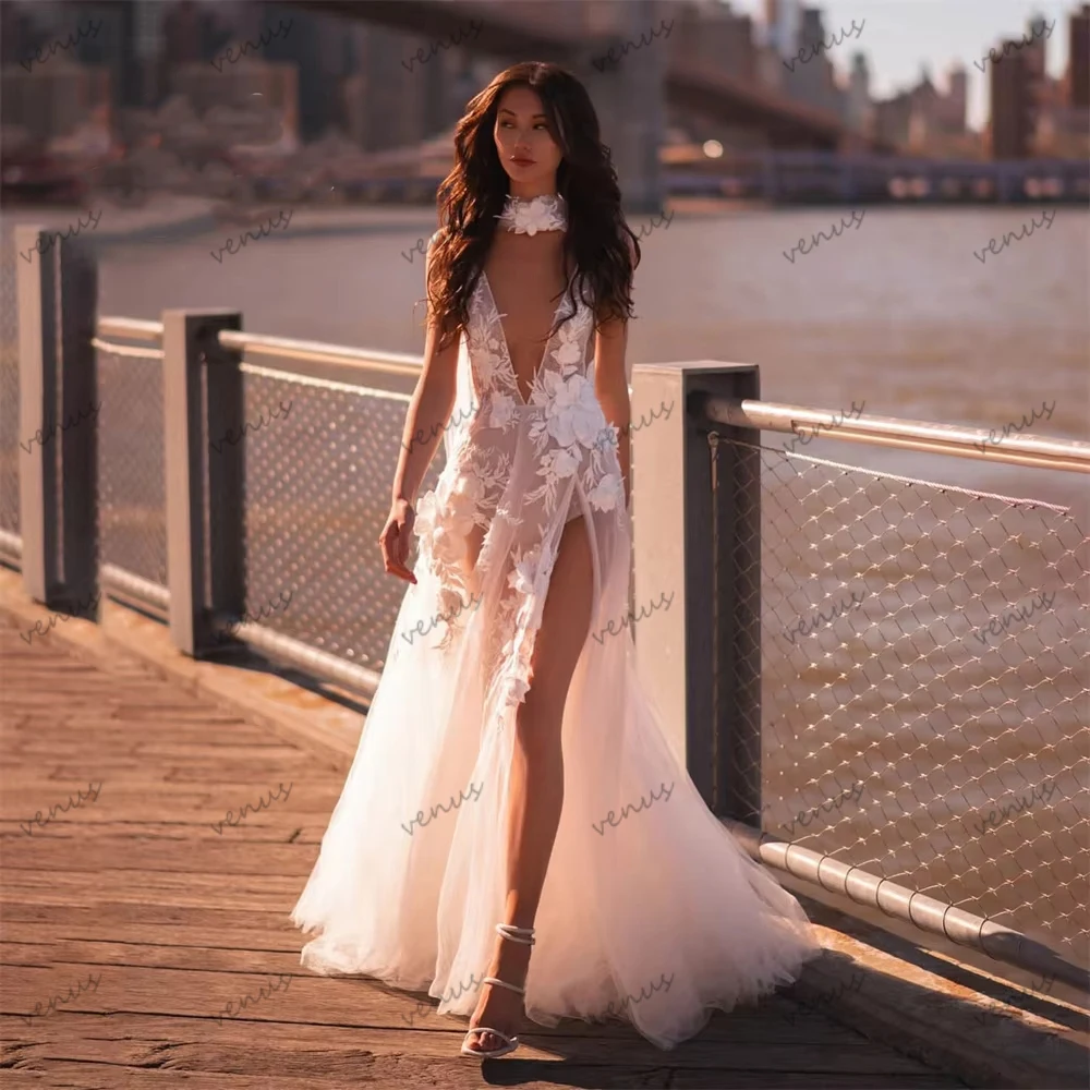 

Изысканные свадебные платья А-силуэта из тюля с многоярусной юбкой, кружевными аппликациями, без рукавов, с глубоким V-образным вырезом, на заказ.