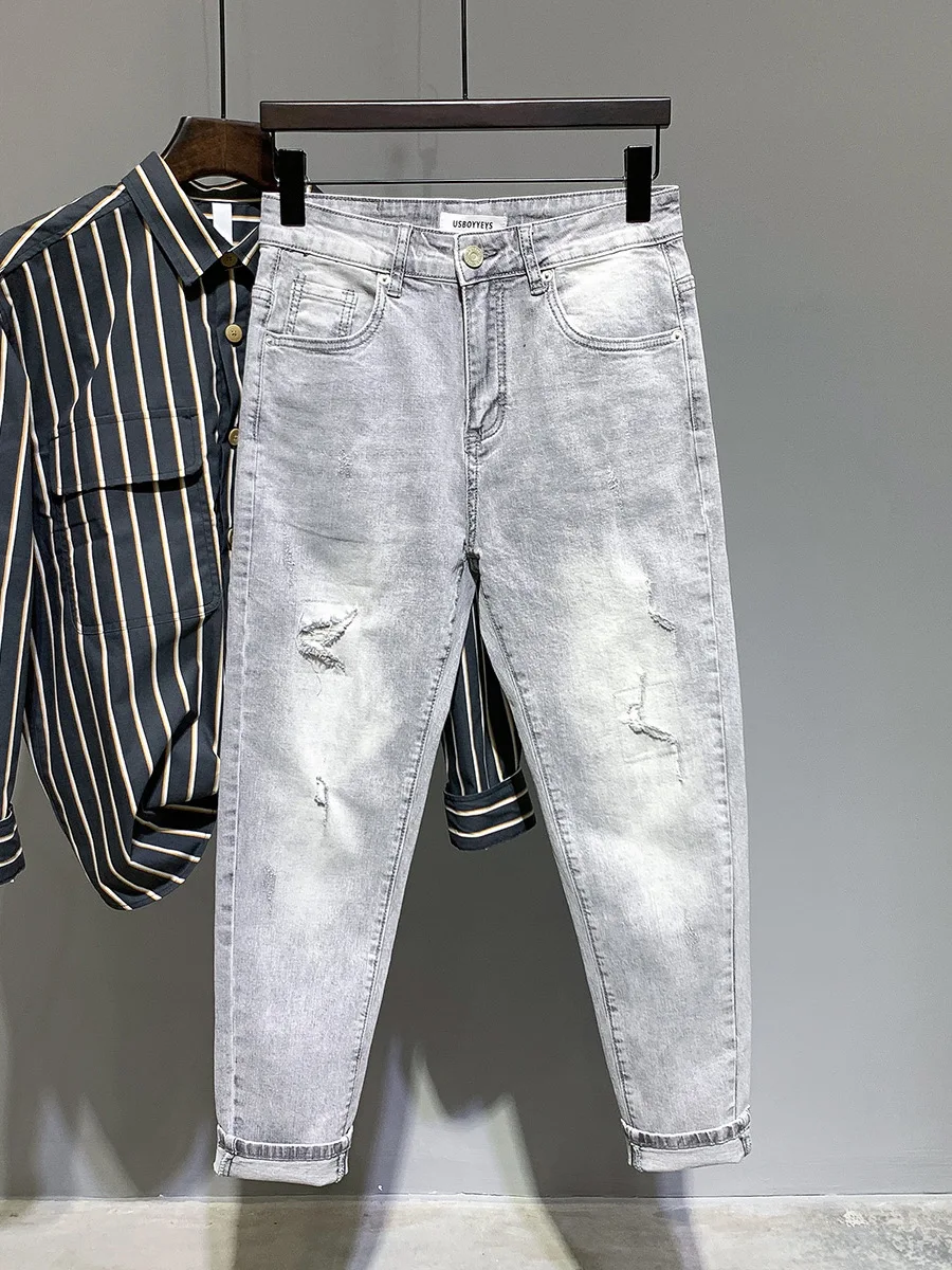 

Модные мужские джинсы Slim Fit 2024 с дизайном «дырки», девятисекционные, весна-осень, корейский стиль, хлопок, стрейч-деним