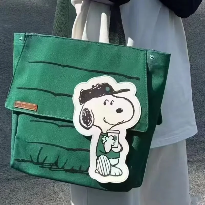 

Новинка 2025, Snoopy, большая вместительная повседневная маленькая свежая сумка с принтом в ленивом стиле, дорожная сумка на плечо для девочек, новогодний подарок