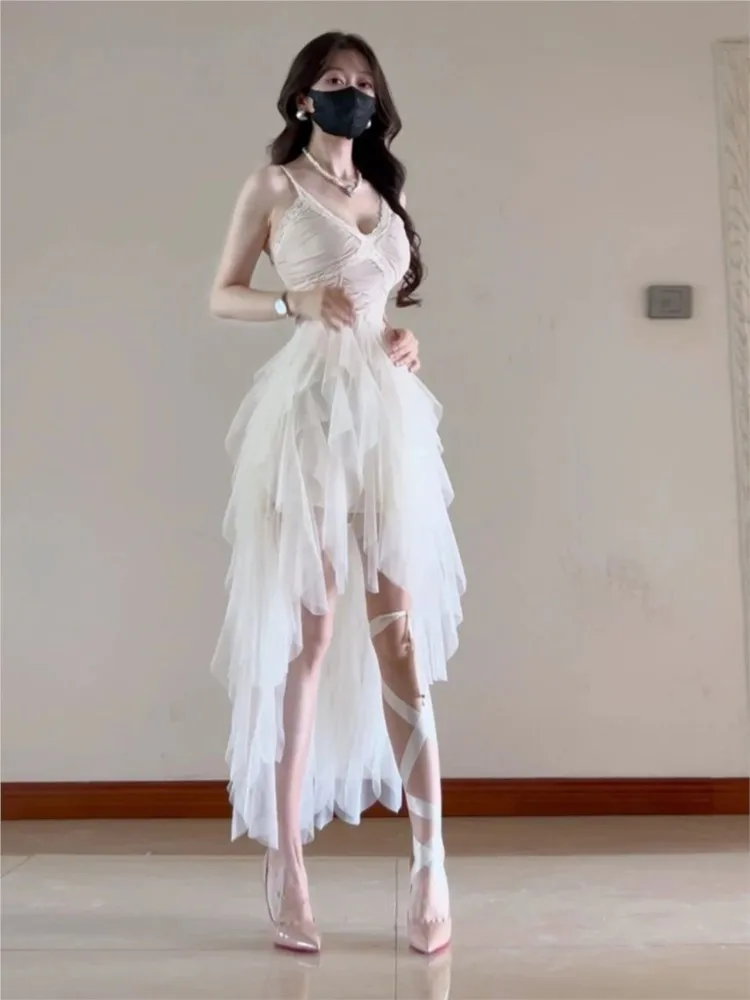 

A gentle and elegant irregularly shaped beautiful unique lace strappy dress with cinched waist