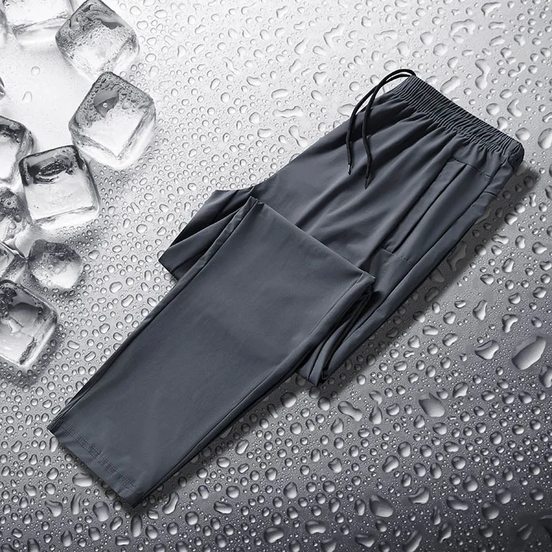 Casual Trendy Men's Solid Color Elastic Pockets for Spring Versatile Slim Fit Ice Silk Breathable Bond Feel Sports Casual Pants
