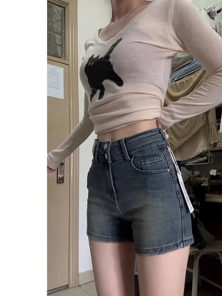 Hochgeschnittene, schlankmachende A-Linien-Jeans-Shorts für Damen, Wintermode, amerikanischer Stil, Hot Pants, figurbetont, hohe Taille