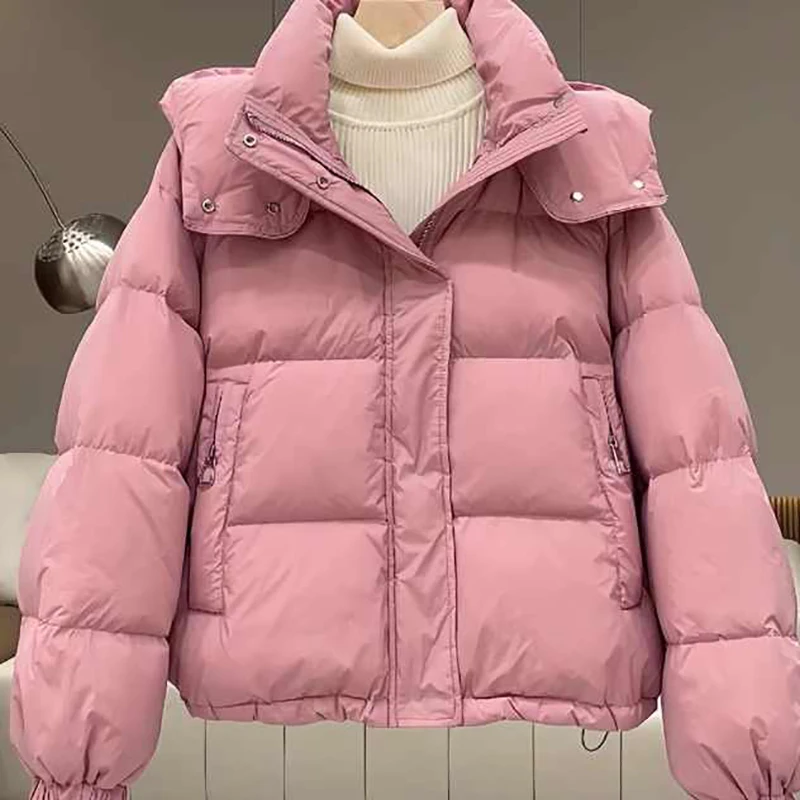 Abrigo de algodón rosa con capucha para mujer, ropa térmica acolchada corta con bolsillo, chaqueta acolchada holgada coreana para ir al trabajo, novedad de invierno, 2024