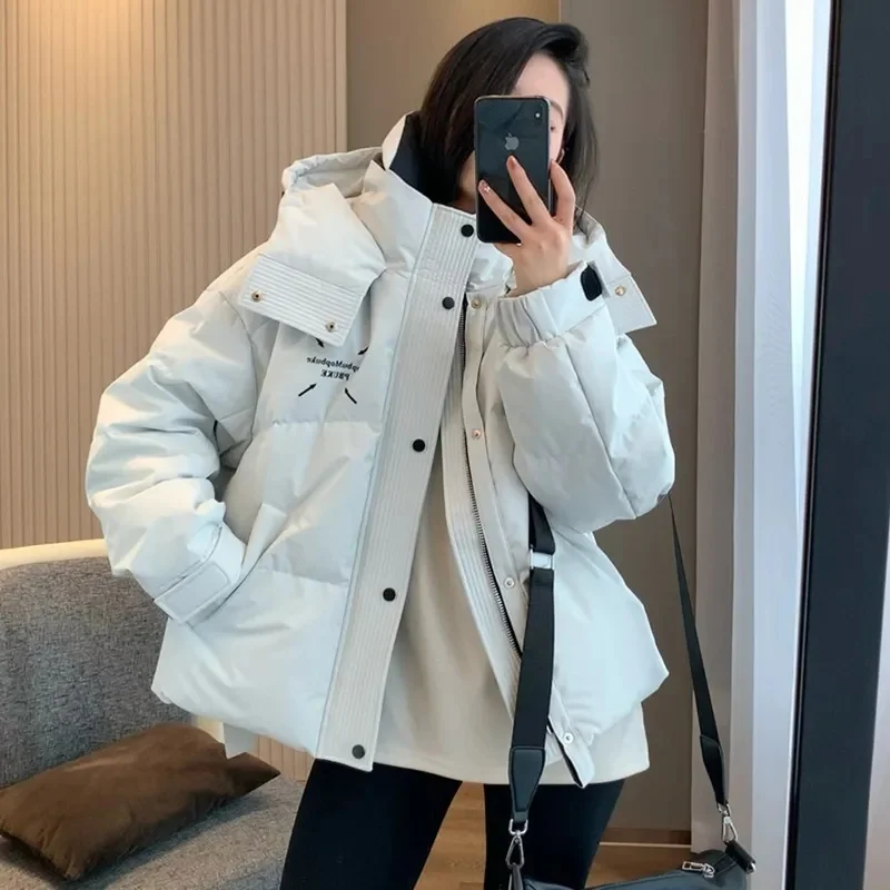 2025 hiver Parkas femmes col montant veste à capuche décontracté épaissir chaud solide coton rembourré veste ample bouffant manteau