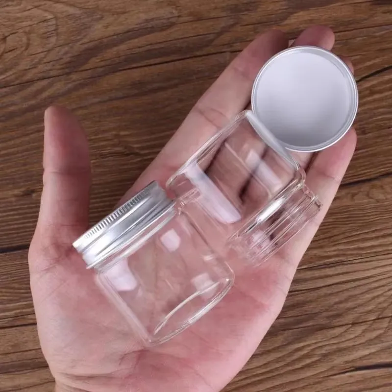 

32pcs 50ml 50ml Transparent Glass Bottle With Silver Aluminum Lid for Body Care Candy and Storage of Soy Based Foods