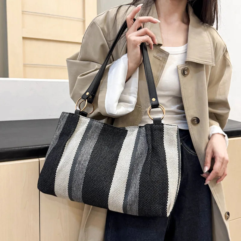 

Casual Fashion Canvas Tote 2025 - Women's Vertical Stripes Personality, Large-Capacity Single-Shoulder/Handheld/Crossbody
