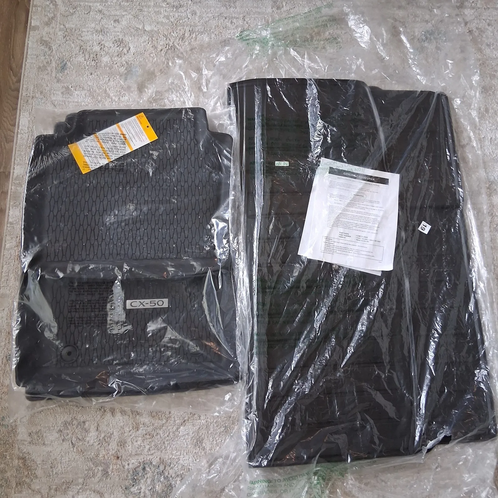 

Оригинальные всепогодные коврики для пола Mazda CX-50 + комплект для багажника (2023-2026)