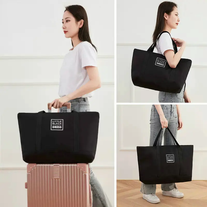 

Simple Black Travel Bag Carry-on Luggage Tote Bags For Women Large Size Duffle Bag Waterproof Traveling Bags For Ladies