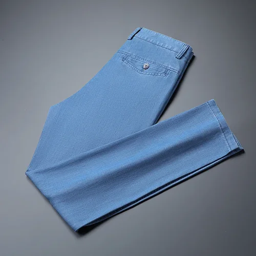 Imagen 2 del producto 2025 Primavera Verano nuevos pantalones vaqueros sueltos finos de color azul claro para hombres moda de negocios pantalones vaqueros elásticos de tela Lyocell pantalones de marca masculina