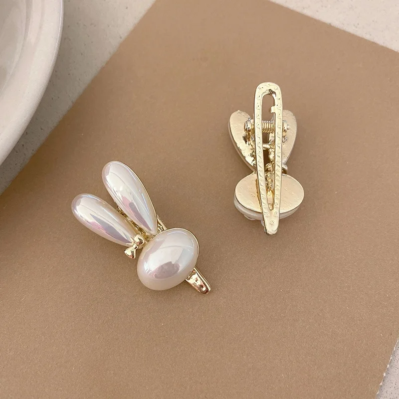 

Новая жемчужная заколка для волос, женская боковая заколка для волос, дизайн, чувственная челка, украшение для волос на лбу, аксессуары для волос с кроличьими ушками