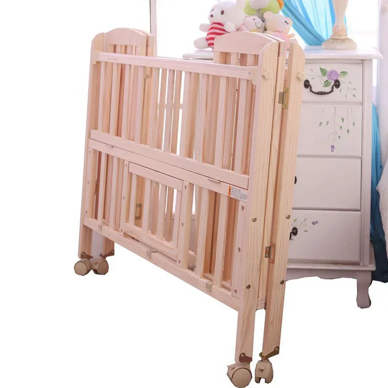 .Folding Crib Solid Wood Environmentally Friendly Paint-free Foldable Multifunctional Baby Crib.