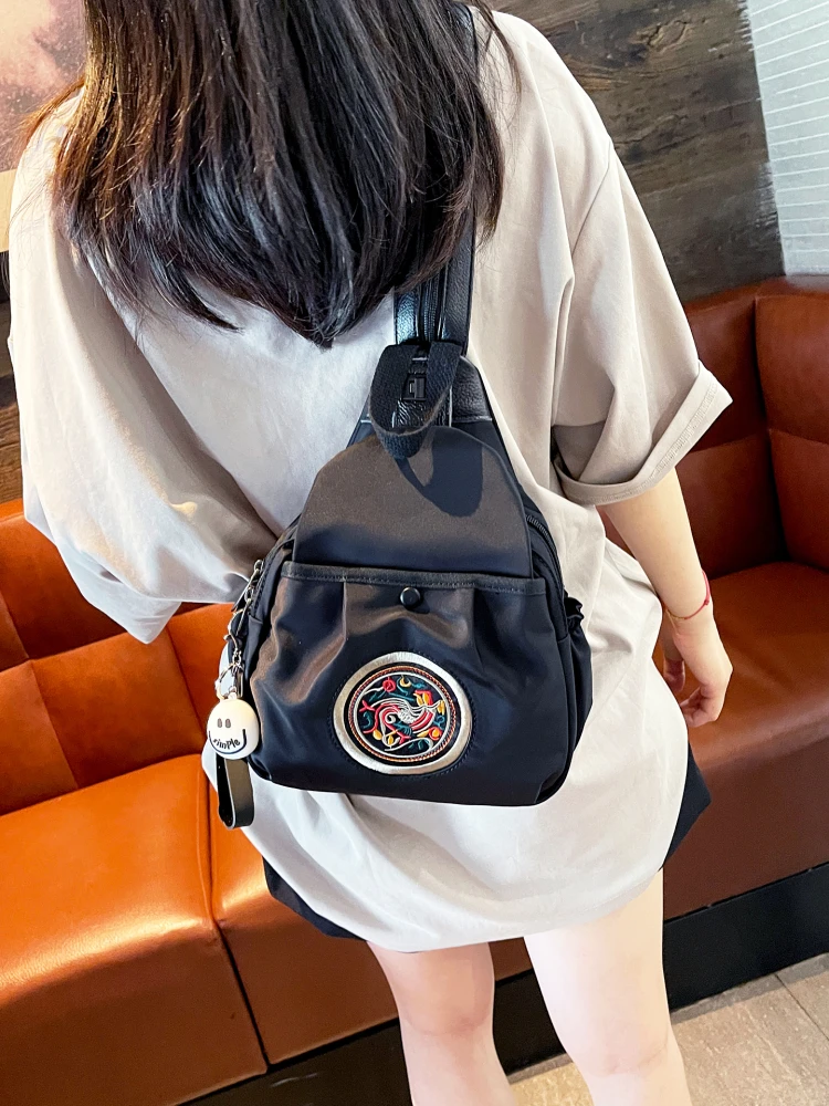 waterproof-lightweight-oxford-cloth-backpack-crossbody-bag-versatile-double-layer-fashionable-shoulder-bag-for-men-and-women