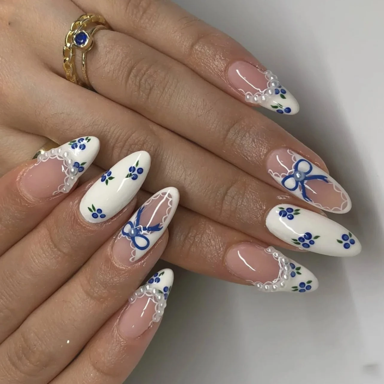 

Blue Flower Bowknot White Pearl French Camellia Heart Long Pointed Fake Nails Art Almond False Nails Rhinestones Press on Nails