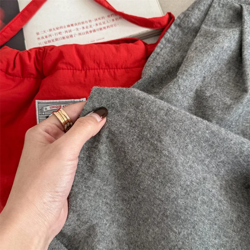 2025 ربيع ملابس الأطفال ملابس الربيع الأطفال النسخة الكورية حزام السراويل نحى تسعة سنت السراويل بنطال ذو قصة أرجل واسعة