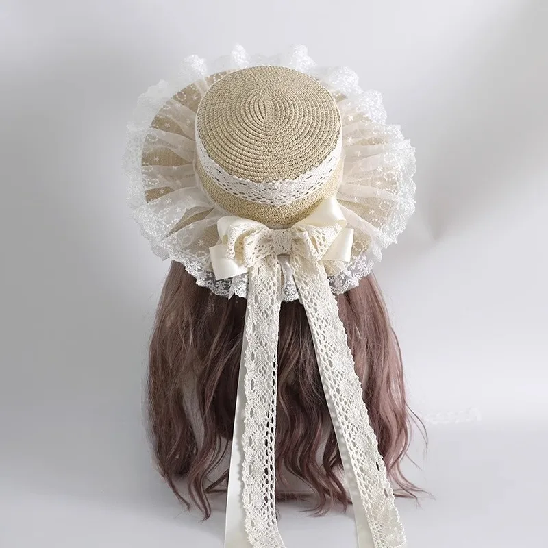 Harajuku النساء البراري شيك القش قبعة الشاطئ قبعة الشمس اليدوية الفتيات الحلو لوليتا نمط تأثيري Kawaii مقوس دانتيل الشريط قبعات من القش