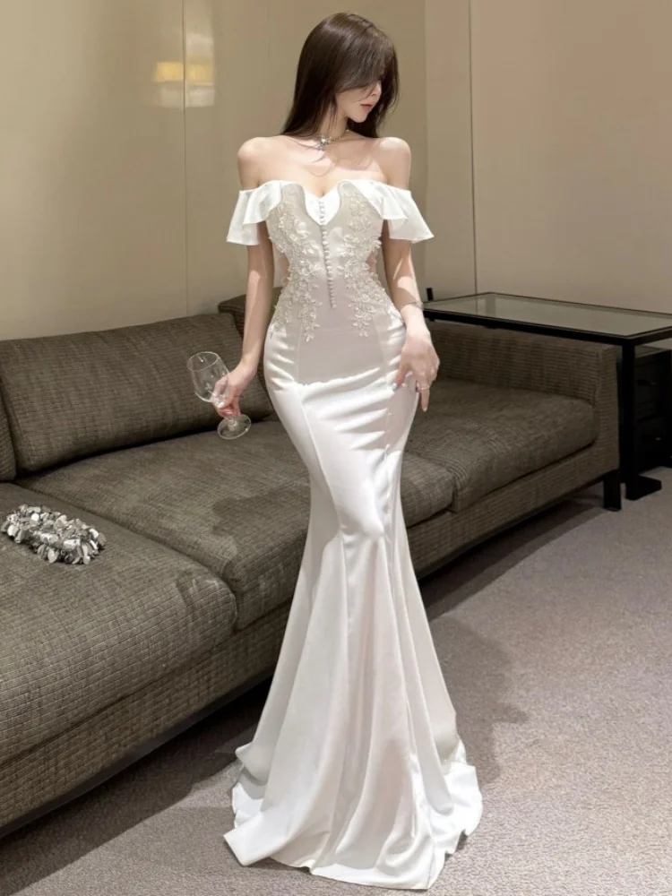 Abito lungo da festa con fiori ricamati di lusso di nuova moda Abito da sera con scollo a barchetta con volant da donna Abiti da sirena a tromba dimagranti