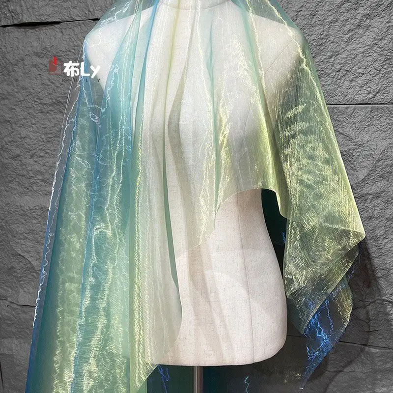 

Colorful gradual change water light yarn laser phantom mesh fabric dress clothing background organza designer fabric
