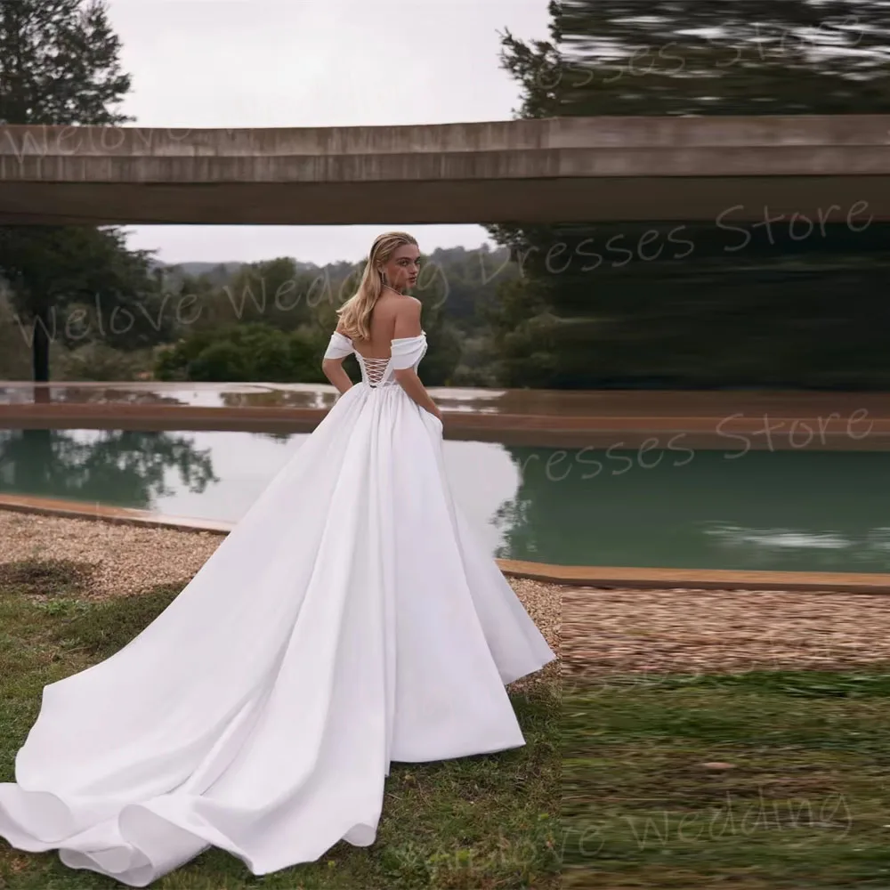 ชุดแต่งงานทรงเอไลน์สำหรับผู้หญิง แขนกุด แบบหรูหรา  ชุดเจ้าสาวสั่งตัดได้  แบบเปิดไหล่  ประดับเลื่อม  ชุดเจ้าสาว