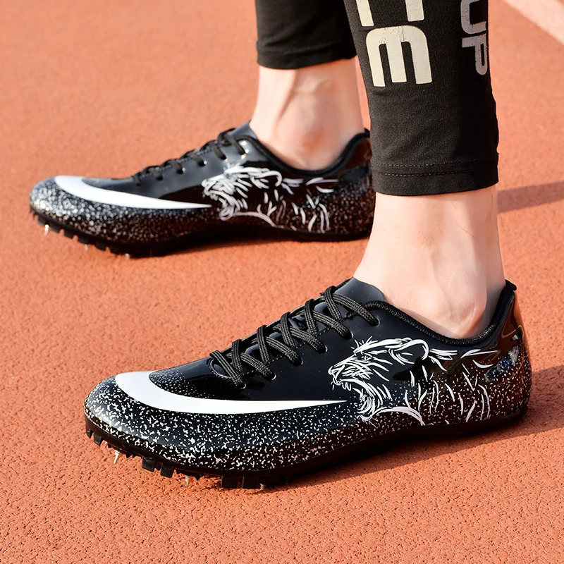 Man Track Spike Profesjonalne buty Lekkoatletyczne buty sportowe dla mężczyzn Kobiety Outdoor Kobiety Siłownia Trampki do biegania Czarny Biały