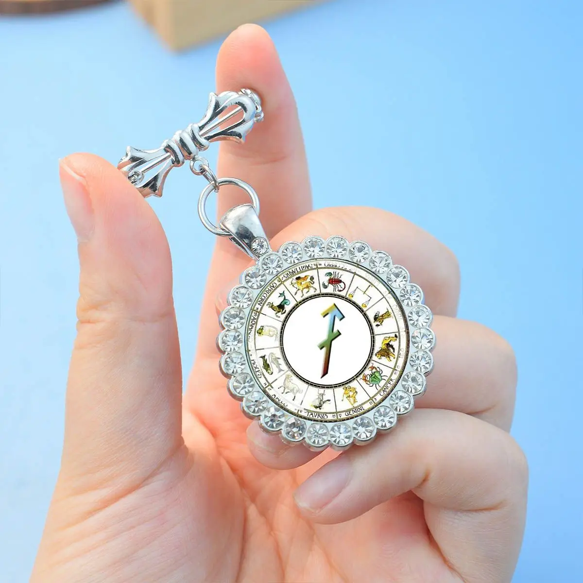 1PC White twelve zodiac circular glass brooch with synthetic zircon trim, suitable for holiday gatherings and birthday gifts.