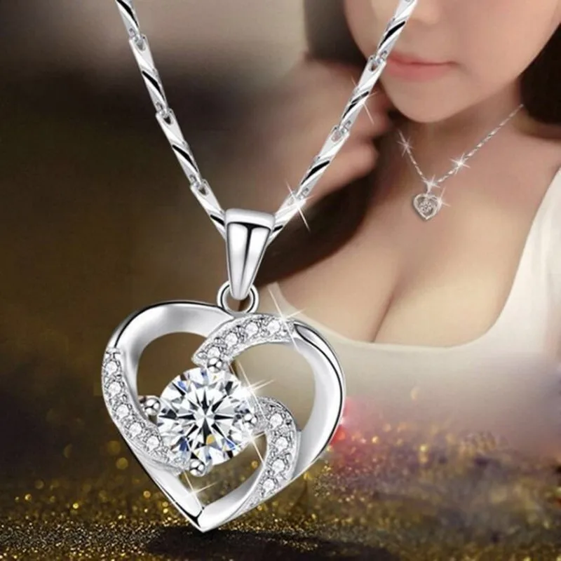 Heart-shaped pendant crafted from white copper with diamond accents and genuine pearl detail in net-red style — available in whi